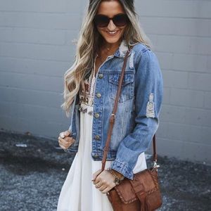 Distressed jean jacket